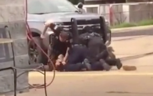 A video of an Arkansas police officer punching a guy led to his suspension with pay